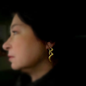 Handmade, gold plated silver earrings. Two birds united, Flying
