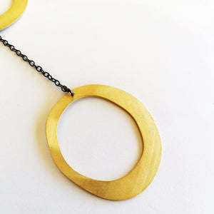 Long gold plated silver chain necklace with two oval elements Abstract
