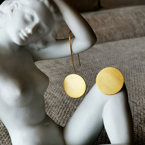 Mismatched dangle earrings, Space discs (gold plated silver)
